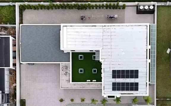 Residential bungalow with solar panels and battery monitoring system in Alamesra, Kota Kinabalu