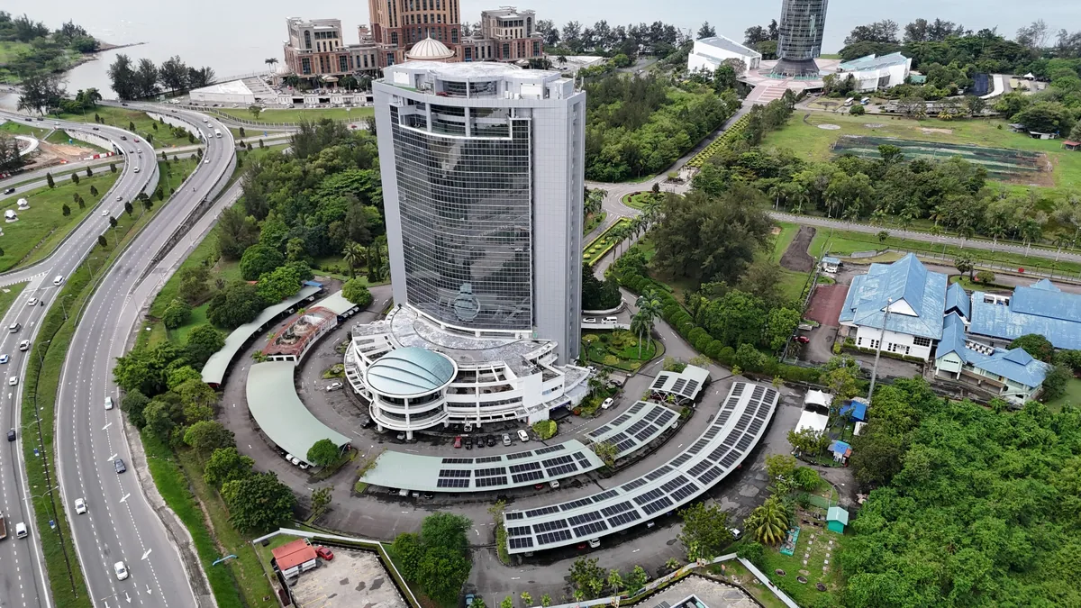 Solar panel installation on a government administrative building rooftop in Kota Kinabalu